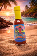 Bottle of Jupiter's Lighthouse hot sauce on a beach with a sunset and palm trees in the background
