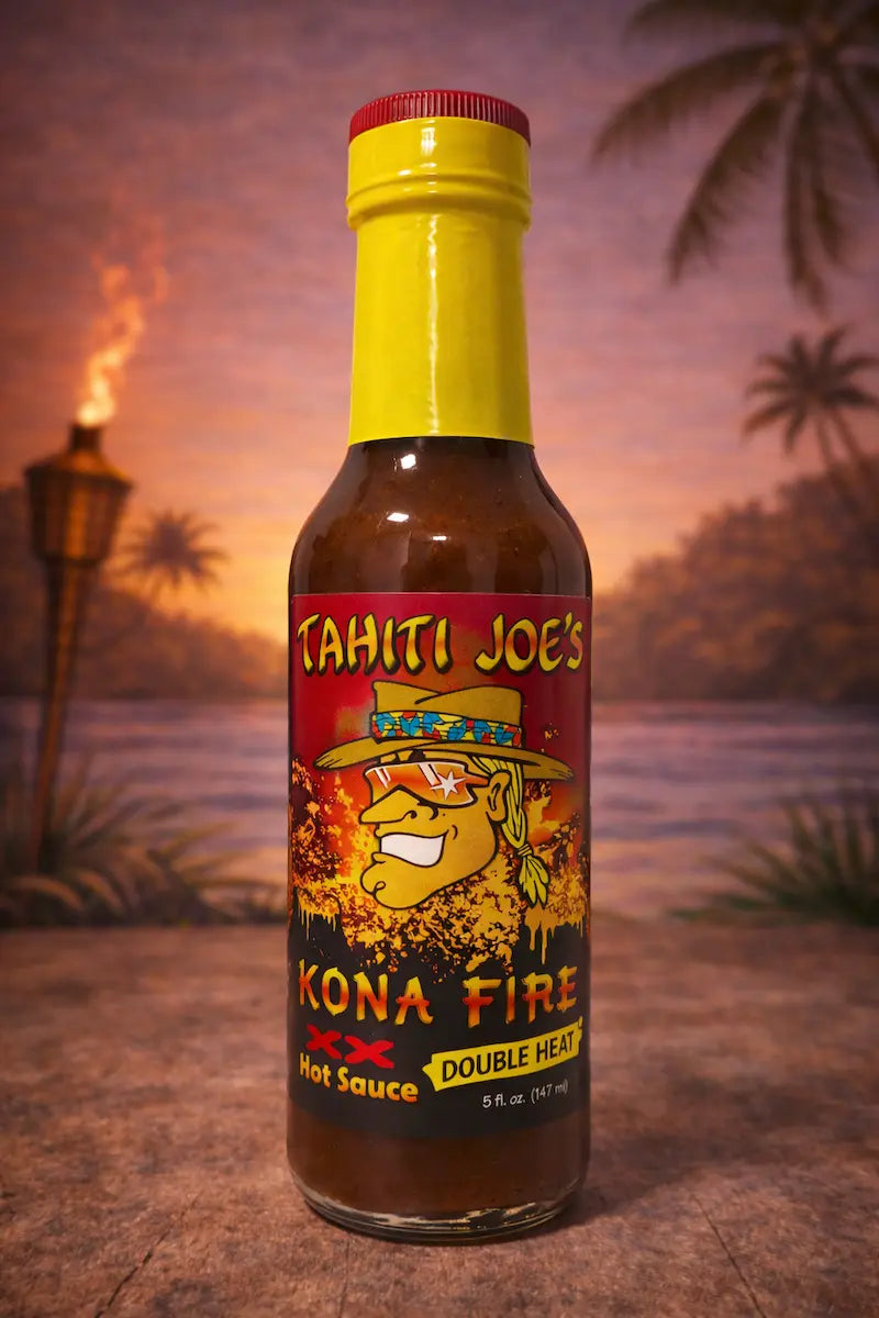Bottle of Tahiti Joe's Kona Fire hot sauce with a tropical background