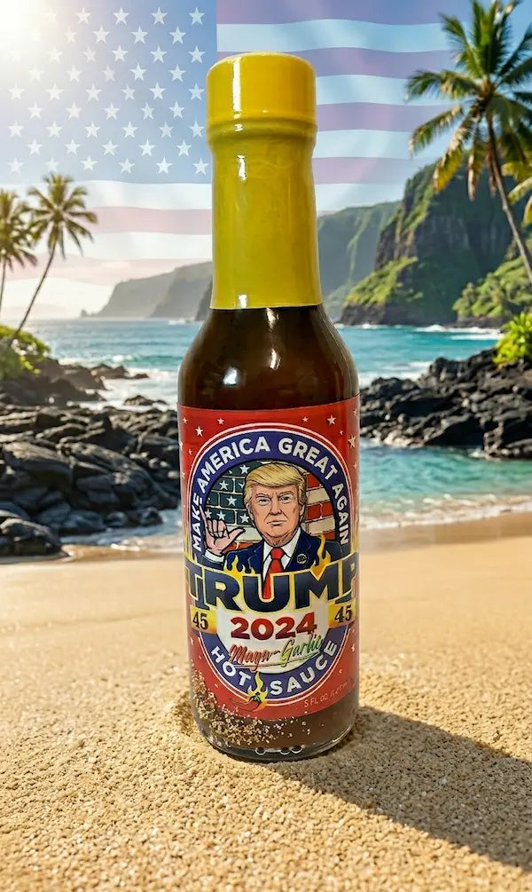 Hot sauce bottle with a label featuring a face and '2024' text, set against a beach and mountain backdrop.